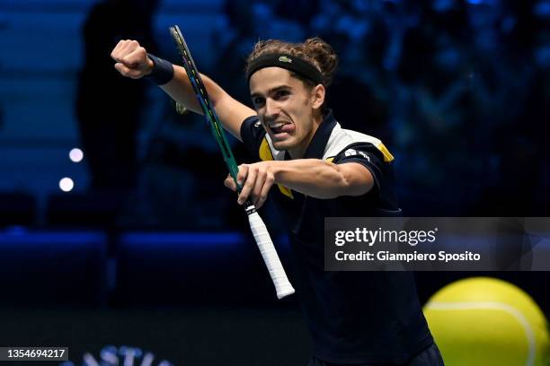 Pierre-Hugues Herbert of France celebrates after winning the Men's Doubles final match between Pierre-Hugues Herbert and Nicolas Mahut of France and...