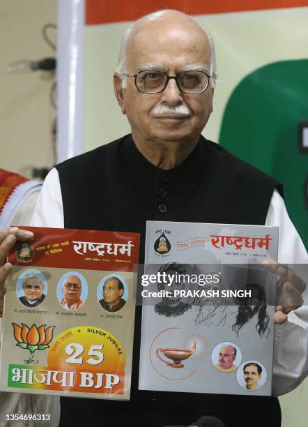 Indian Leader of Opposition L. K. Advani releases the Rashtriya Swayamsevak Sangh magazine Rashtradharm and a book at Bharatiya Janta Party...