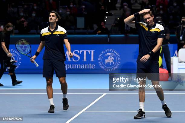 Nicolas Mahut and Pierre-Hugues Herbert of France celebrate after winning the Men's Doubles final match between against Rajeev Ram of USA and Joe...