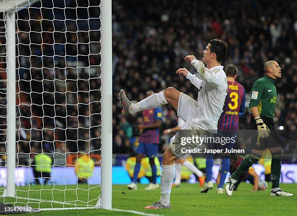 Cristiano Ronaldo of Real Madrid kicks the goalpost out of frustration as he fails to score during the la Liga match between Real Madrid and...