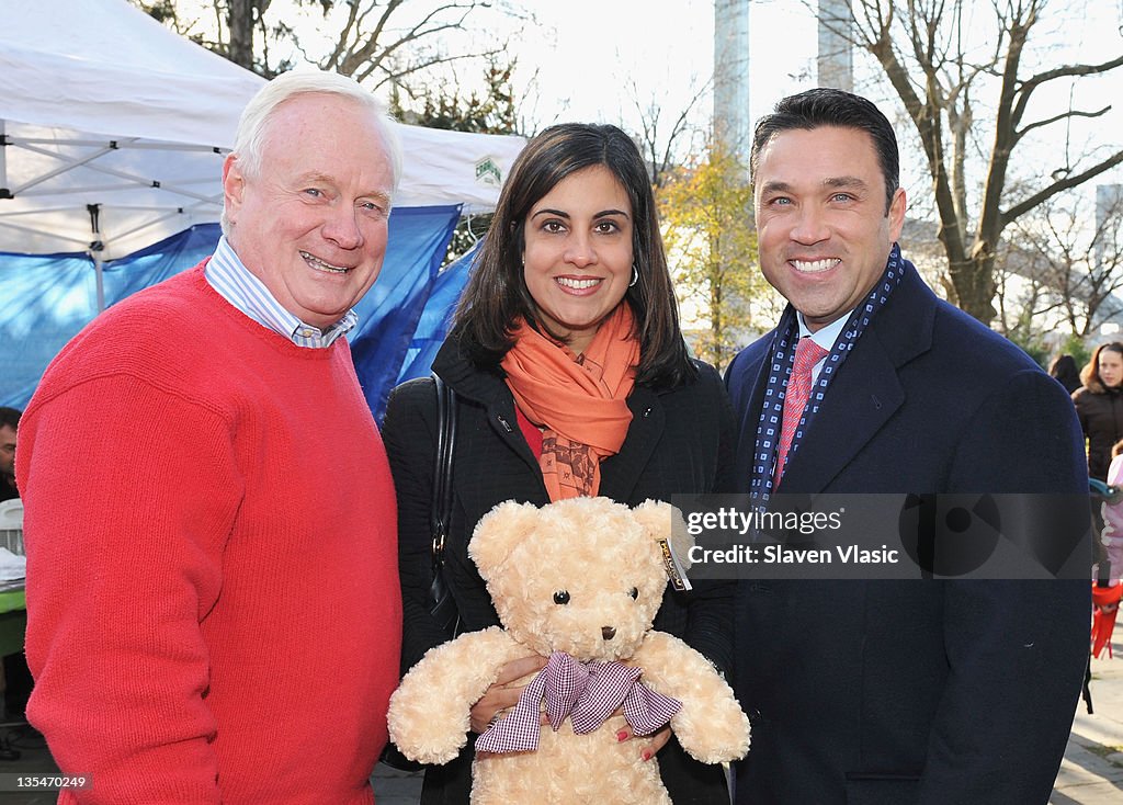 Help Santa Stuff A Buss Full Of Toys Event