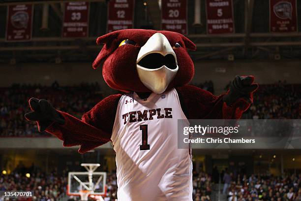 Hooter the mascot for the Temple Owls performs against the Villanova Wildcats at the Liacouras Center on December 10, 2011 in Philadelphia,...