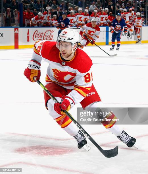 Andrew Mangiapane of the Calgary Flames skates against the New York Islanders at the UBS Arena on November 20, 2021 in Elmont, New York. The game was...