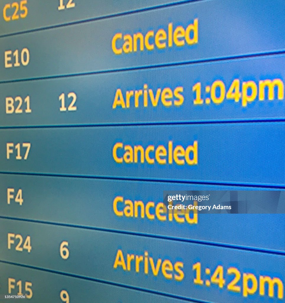 Status Board Indicating Canceled Flights in Chicago