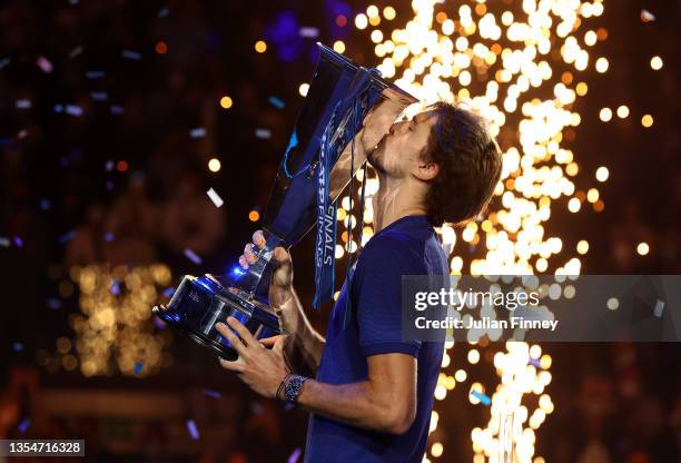 Alexander Zverev of Germany celebrates with the trophy following victory in the Men's Single's Final between Alexander Zverev of Germany and Daniil...
