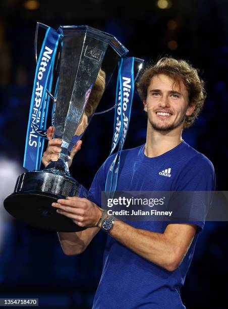 Alexander Zverev of Germany poses with the trophy following victory in the Men's Single's Final between Alexander Zverev of Germany and Daniil...