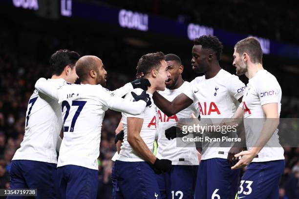 Sergio Reguilon of Tottenham Hotspur celebrates with team mates after scoring their side's second goal during the Premier League match between...