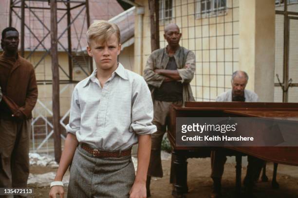 British actor Simon Fenton as the 12-year-old P.K., with actors Armin Mueller-Stahl and Morgan Freeman as his mentors, in the film 'The Power of...