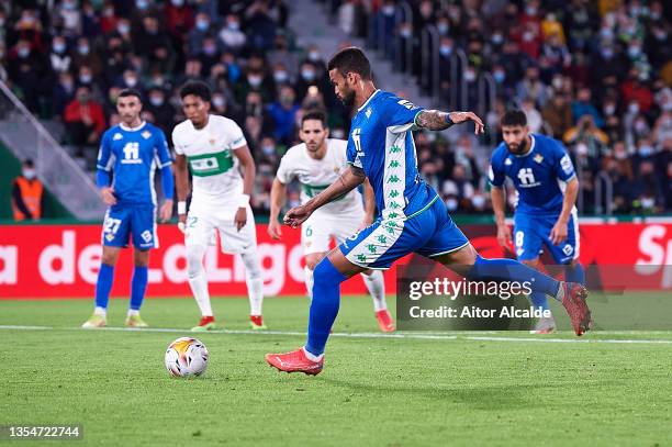 Willian Jose of Real Betis shoot to score their second side goal during the La Liga Santander match between Elche CF and Real Betis at Estadio Manuel...