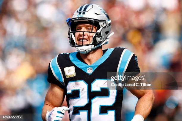 Christian McCaffrey of the Carolina Panthers celebrate the first touchdown during the first quarter of the game against the Washington Football Team...