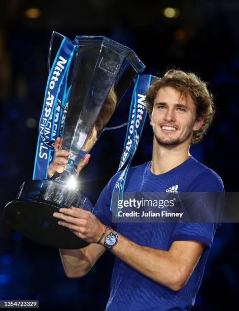 Alexander Zverev of Germany poses with the trophy following victory in the Men's Single's Final between Alexander Zverev of Germany and Daniil...