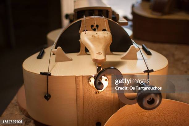 detail of a hurdy-gurdy in the luthier's workshop - musical instrument repair stock pictures, royalty-free photos & images