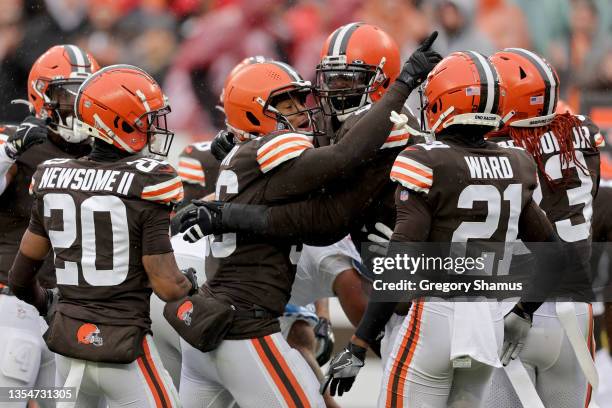 Malcolm Smith of the Cleveland Browns celebrates with teammates after an interception in the first quarter against the Detroit Lions at FirstEnergy...