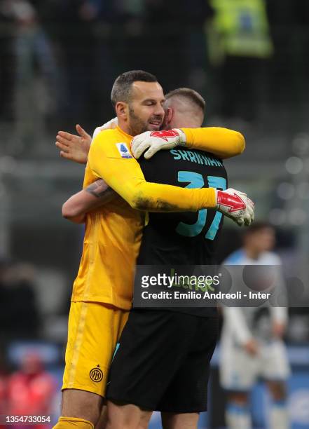 Samir Handanovic of FC Internazionale celebrates the victory with Milan Skriniar at the end of the Serie A match between FC Internazionale and SSC...