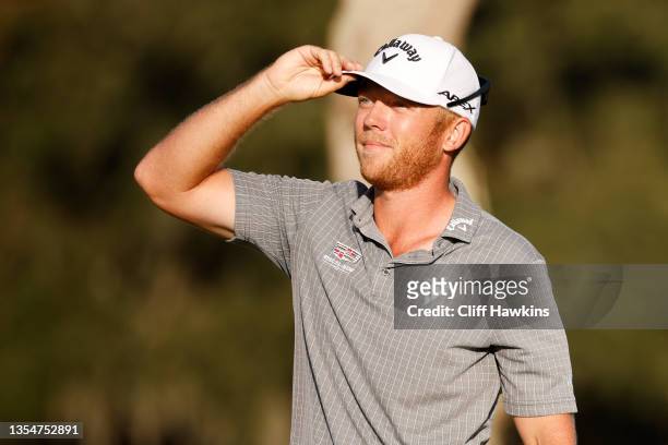 Talor Gooch of the United States celebrates on the 18th green after winning during the final round of The RSM Classic on the Seaside Course at Sea...