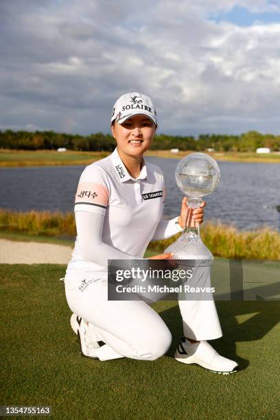 Jin Young Ko of Korea poses for a photo with the CME Globe trophy after winning the CME Group Tour Championship at Tiburon Golf Club on November 21,...