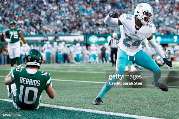 Byron Jones of the Miami Dolphins reacts after breaking up a touchdown pass intended for Braxton Berrios of the New York Jets in the first quarter at...