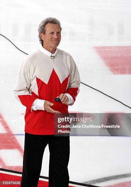 Summit Series hero Paul Henderson gets ready for the ceremonial puck drop prior to the start of an NHL game between the Ottawa Senators and the...