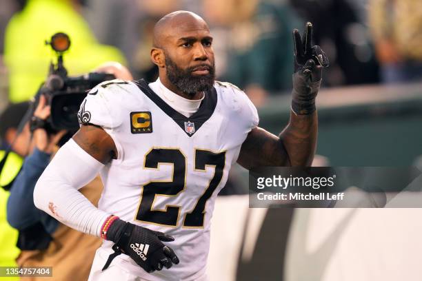 Malcolm Jenkins of the New Orleans Saints signals to the crowd as he runs off the field following the 40-29 loss to the Philadelphia Eagles at...