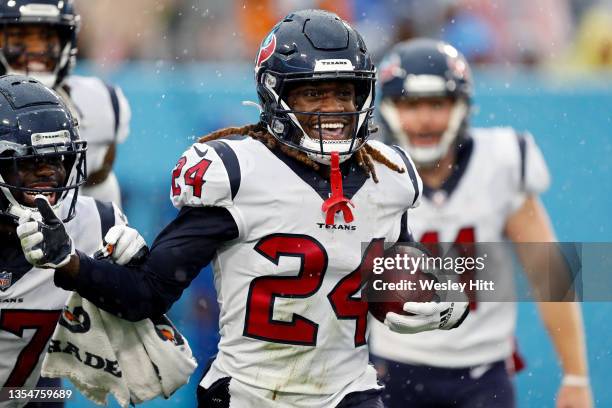 Tremon Smith of the Houston Texans celebrates after a defensive play in the second half against the Tennessee Titans at Nissan Stadium on November...