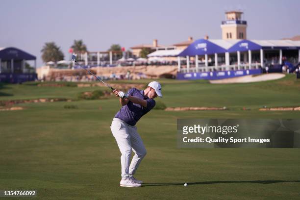 Matthew Fitzpatrick of England plays a shot during Day Four of The DP World Tour Championship at Jumeirah Golf Estates on November 21, 2021 in Dubai,...