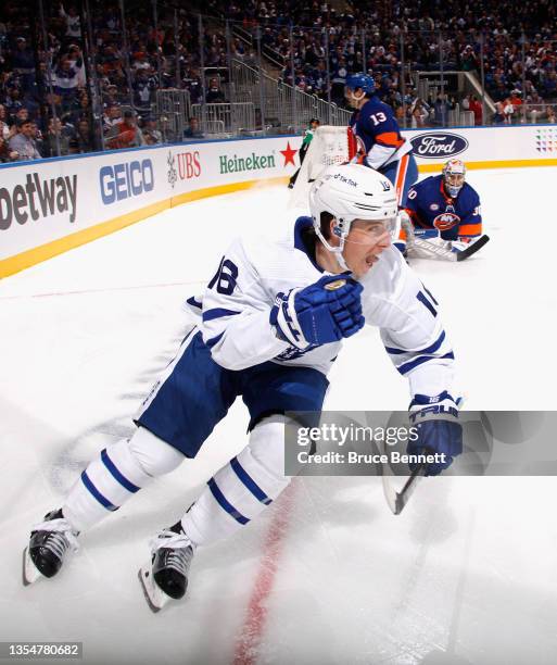 Mitchell Marner of the Toronto Maple Leafs celebrates his first period shorthanded goal against the New York Islanders at the UBS Arena on November...