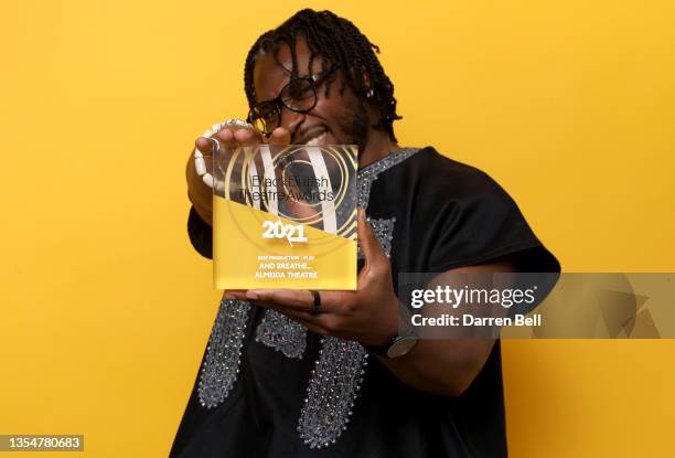 Yomi Sode poses with his award for Best Production - Play for "And Breathe..." at the Almeida Theatre, during a portrait session at the Black British...