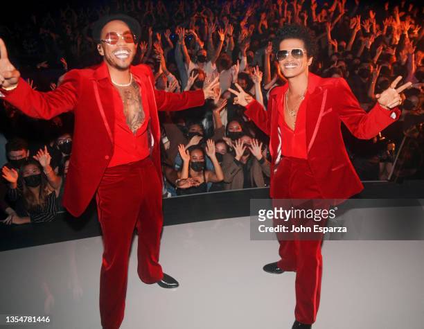 In this image released on November 21, Anderson .Paak and Bruno Mars of Silk Sonic perform onstage for the 2021 American Music Awards at Microsoft...