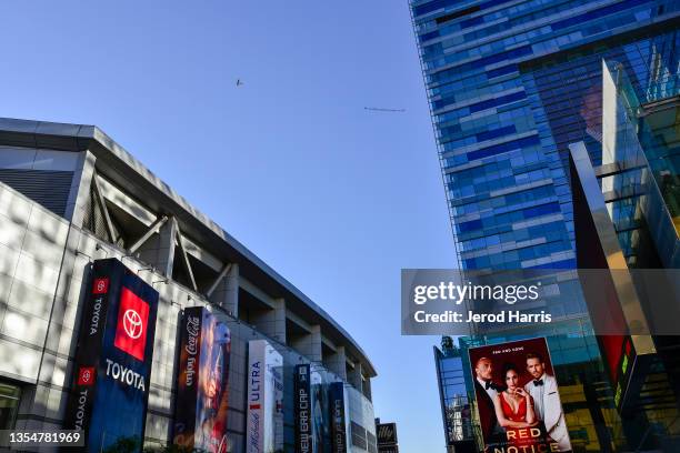 An airplane towing a banner urging Justin Bieber to cancel his upcoming concert in Saudi Arabia flies over the Microsoft Theater on November 21, 2021...