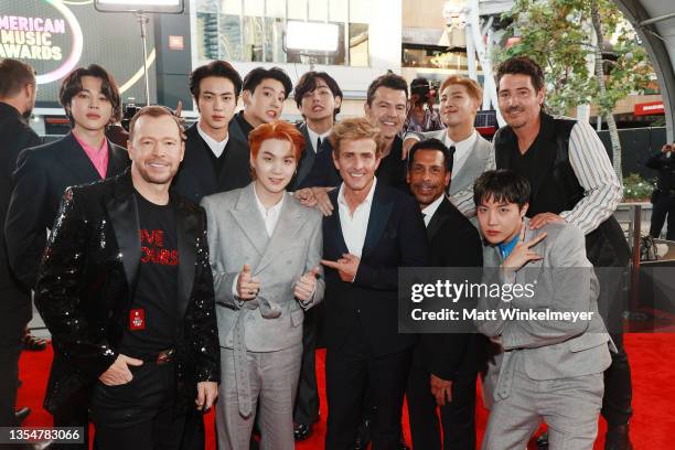 Jimin of BTS, Donnie Wahlberg of New Kids On The Block , Jin, Junkook, Suga, and V of BTS, Joey McIntyre, Jordan Knight, and Danny Wood of NKOTB, RM...