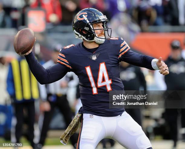 Andy Dalton of the Chicago Bears passes against the Baltimore Ravens at Soldier Field on November 21, 2021 in Chicago, Illinois. The Ravens defeated...