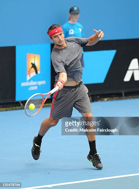 Marinko Matosevic of Victoria in his match against JamesDuckworth of New South Wales at Melbourne Park on December 11, 2011 in Melbourne, Australia.