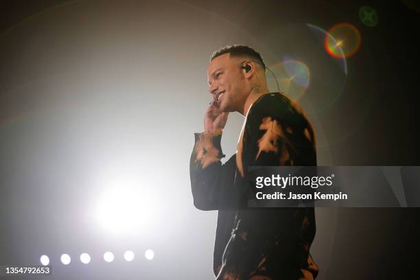 In this image released on November 21, Kane Brown performs onstage at Tennessee State University for the 2021 American Music Awards broadcast on...