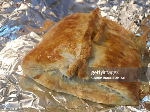 baked burekas on a baking tray - turkey middle east stock-fotos und bilder
