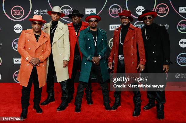 Michael Bivins, Ronnie DeVoe, Bobby Brown, Ricky Bell, Ralph Tresvant, and Johnny Gill of New Edition pose in the Press Room at the 2021 American...