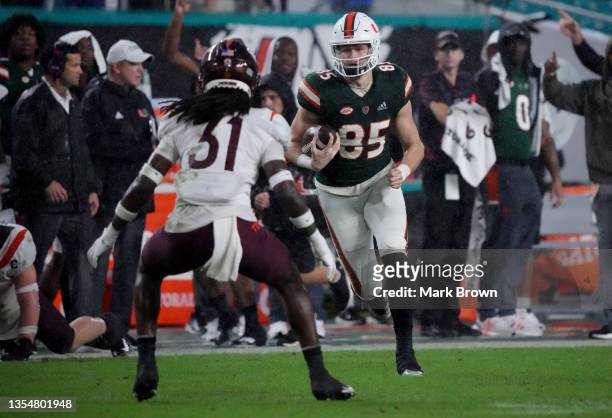 Will Mallory of the Miami Hurricanes makes a catch for a touchdown against the Virginia Tech Hokies at Hard Rock Stadium on November 20, 2021 in...