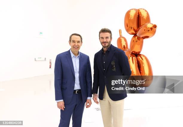 Jeff Koons leads David Beckham on a tour of his exhibition “Lost in America” on November 20, 2021 at Qatar Museums Gallery ALRIWAQ in Doha, Qatar....