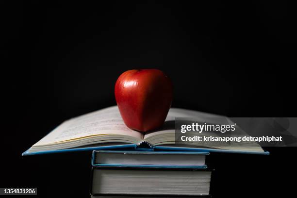 education  concept,book,book with apple - teacher desk fotografías e imágenes de stock