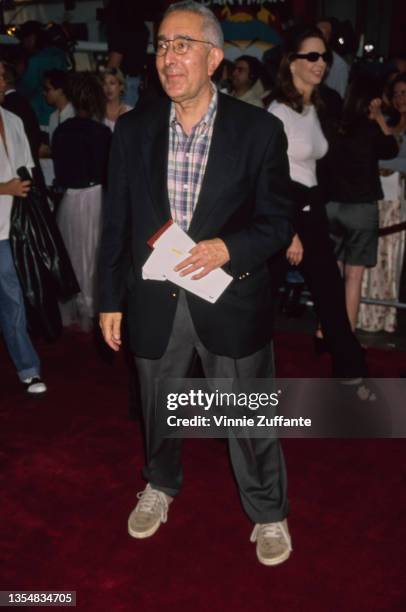 American actor and comedian Ben Stein, wearing a dark blue blazer, a checked shirt and grey trousers, attends the Hollywood premiere of 'South Park:...
