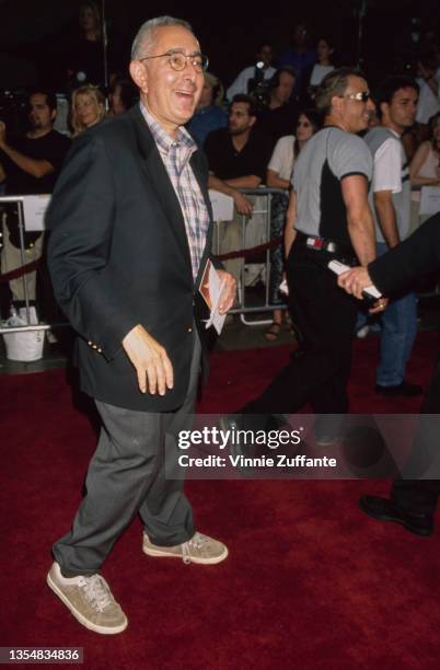 American actor and comedian Ben Stein, wearing a dark blue blazer, a checked shirt and grey trousers, attends the Hollywood premiere of 'South Park:...