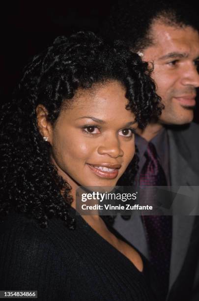 American actress Kimberly Elise and her husband, American photographer Maurice Oldham , attend the Westwood premiere of 'Beloved' held at the Mann...