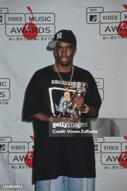 American rapper and record producer Puff Daddy, holding his 'Best R&B Video' Moonman award, in the press room of the 1997 MTV Video Music Awards,...