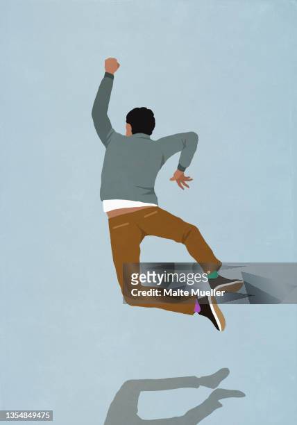 happy man jumping for joy - jumping stock illustrations
