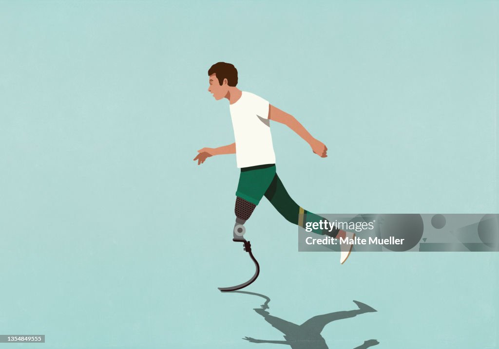 Male amputee with prosthetic leg jogging