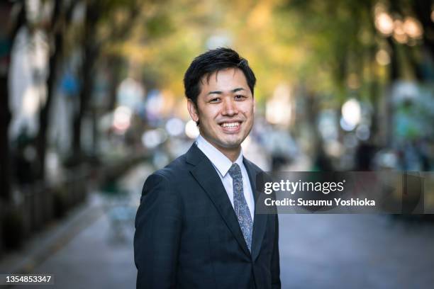 businessmen meeting and working in a big city. - portrait business japanese stock pictures, royalty-free photos & images