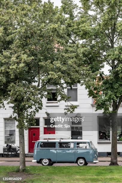 volkswagen transporter, kombi or microbus campervan parked on the street - middelburg netherlands bildbanksfoton och bilder
