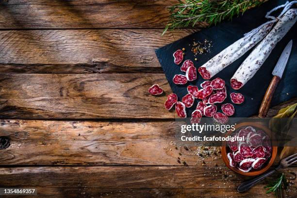 spanish food: sliced chorizo still life. copy space - smoked stock pictures, royalty-free photos & images