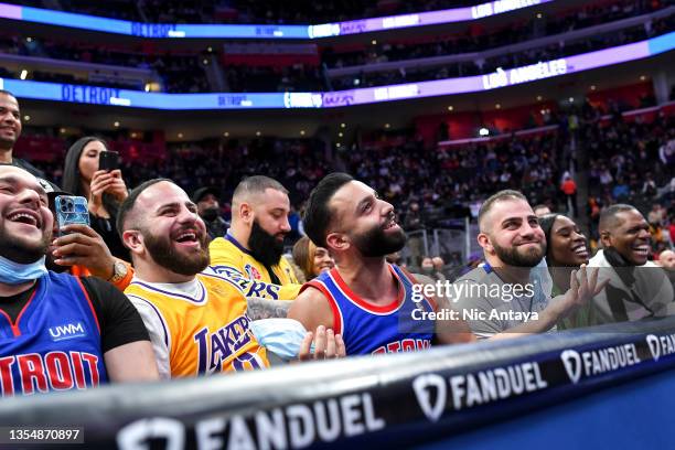 Fans joke with the Los Angeles Lakers during the fourth quarter of the game against the Detroit Pistons at Little Caesars Arena on November 21, 2021...