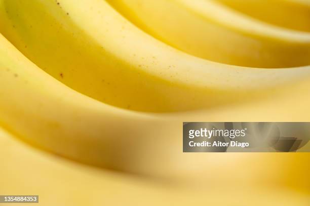 close-up of  bananas. - banana split fotografías e imágenes de stock