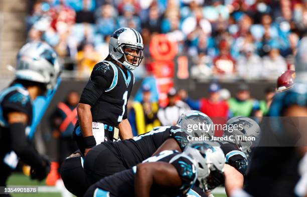 Cam Newton of the Carolina Panthers prepares for the snap during the first half of the game against the Washington Football Team at Bank of America...